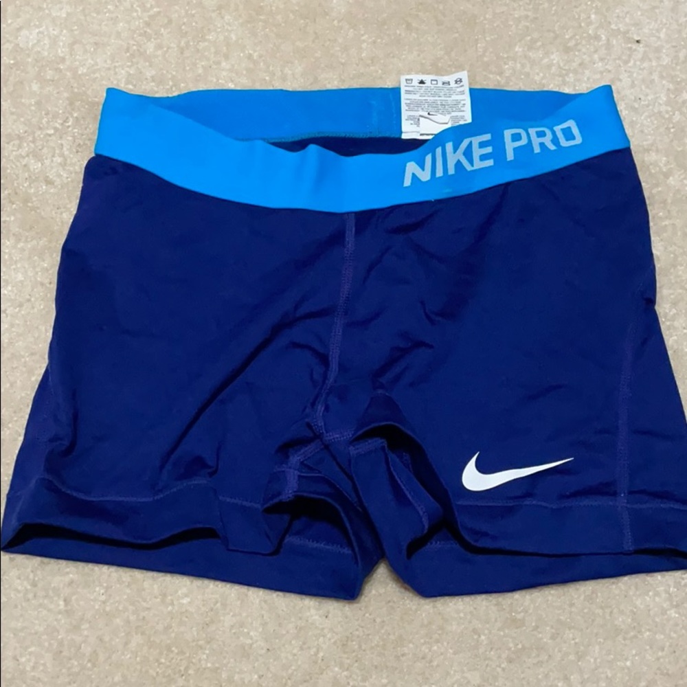 Blue Nike dri fit spandex shorts